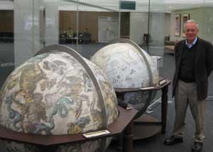 Bill Compston with Coronelli globes, National Library, Canberra