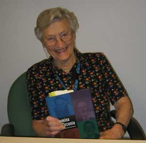Joy Bear with her book